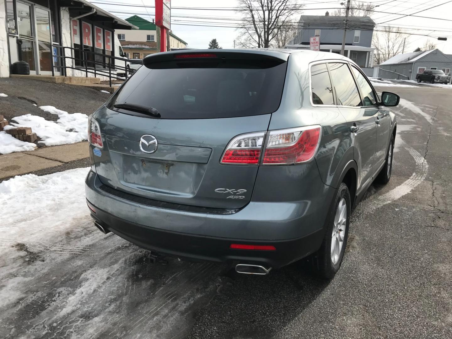 2012 Green /Tan Mazda CX-9 Sport (JM3TB3BV4C0) with an 3.7 V6 engine, Automatic transmission, located at 577 Chester Pike, Prospect Park, PA, 19076, (610) 237-1015, 39.886154, -75.302338 - Photo#5